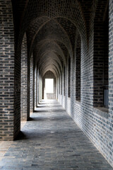 Canvas Print - Long corridor with many columns