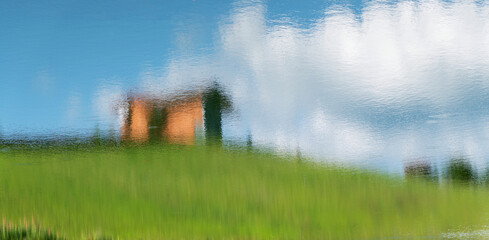 Canvas Print - The cabin is reflected on the lake