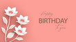 Birthday greeting banner in paper cut style. Abstract paper flowers on a pink background