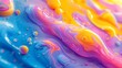 an image of liquid paint on the surface of a blue and orange cake