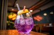 Closeup shot of a purple cocktail set on a wooden table in a restaurant