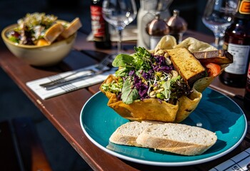 Closeup view of a healthy salad filled in a crispy bread