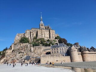 Wall Mural - View of Mont-Saint-Michel. Tidal island and mainland commune in Normandy, France.