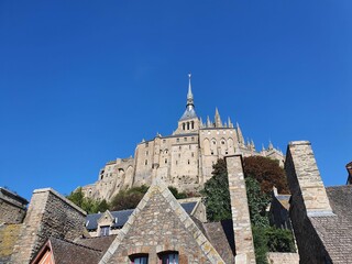 Wall Mural - View of Mont-Saint-Michel. Tidal island and mainland commune in Normandy, France.