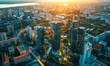 Futuristic Urban Development Visualization: Aerial View of VFX Augmented 3D Construction in Cityscape