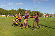 © Austockphoto - children in football team training on playing field