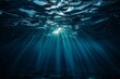 Dark blue ocean surface. view from under water. rays of sun break through the thick water. generative ai