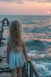 A young girl standing on a pier, gazing at the vast ocean. Suitable for travel and vacation themes