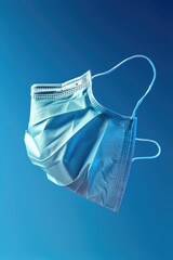 Poster - A surgical mask hanging from a string. Suitable for healthcare concepts