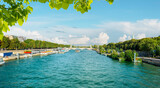 Fototapeta Krajobraz - Wide river Seine in Paris