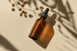 Essential oil dropper bottle with natural shadow on beige, herbal skincare concept.