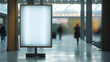 vertical blank white A0 size ad framed space in a public space interior, small billboard, shopping mall or airport