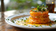 Delicious stack of seasoned potatoes with herb garnish, a tantalizing argentine dish