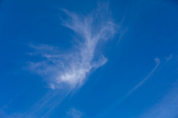 white clouds under blue sky background