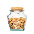 Walnut kernel halves, in glass jar isolated on white background. Shelled, dried seeds of the common walnut tree Juglans regia, used as snack or for baking isolated on white background,