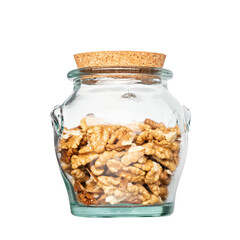 Wall Mural - Walnut kernel halves, in glass jar isolated on white background. Shelled, dried seeds of the common walnut tree Juglans regia, used as snack or for baking isolated on white background,