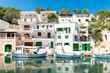 White houses with traditional boats in the port of Cala Figuera - 2534