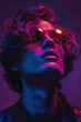 man in sunglasses with neon lights in studio