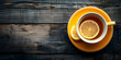 A cup of tea with lemon high angle view on a dark wooden background