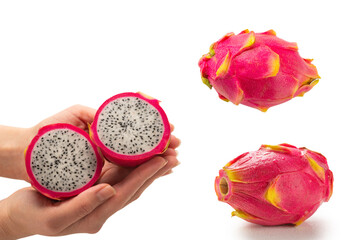 Wall Mural - Sweet tasty dragon fruit or pitaya in woman hand isolated.