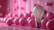 Exceptional white light bulb surrounded by pink light bulbs on a pink background. Minimal conceptual idea concept.