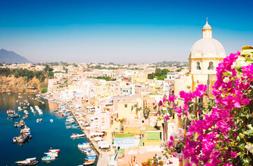 Wall Mural - Procida island harbour details, colorful town with harbour and flowers, Italy