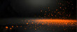 A dark scene with sparkling orange particles, evoking energy and the concept of life's building blocks