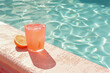 Refreshing Summer Drink by the Poolside with Citrus Slice