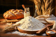 Rustic Homemade Bread with Wheat and Flour on Wooden Table