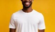 Attractive African American man wearing blank white t-shirt on yellow background. Mockup for tshirt print design