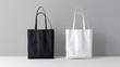 Stylish Tote Bags: White and Black Mockups Against a Grey Background