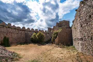 Wall Mural - Cathar castle at the top of a mountain in the south of France