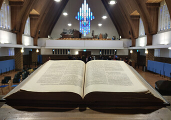 Old Bible on pulpit in a Protestant church