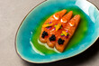 Gourmet meal salmon with caviar and green oil