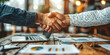 © Gonzalo - Successful business merger handshake with upward graphs symbolizing growth and teamwork in a corporate cityscape