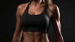 © triocean - Fitness model in black outfit with well defined muscles.
