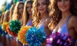 Close-up of a group of cheerleaders in colorful uniforms, with pom-poms in motion