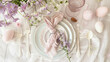 Easter table setting with painted eggs, spring flowers and crockery