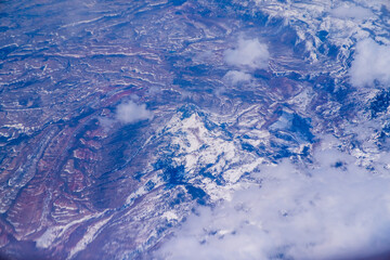 Wall Mural - beautiful view of the landscape from the window of an airplane.