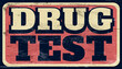 Aged and worn drug test sign on wood