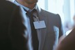 close-up of name tag of businessman at conference