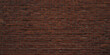 Old brown brick wall background. Wide high resolution textured banner.