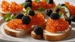 Slices of bread, generously topped with cream cheese, adorned with orange caviar, blackberries, all elegantly arranged on white plate. Each slice features garnish of fresh mint leaves.