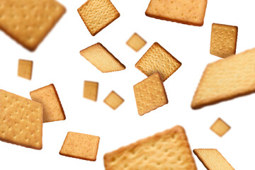 Wall Mural - Tasty dry square crackers falling on white background