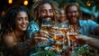 © Jennifer - Group of multi ethnic friends having backyard dinner party together - Diverse young people sitting at bar table toasting beer glasses in brewery pub garden