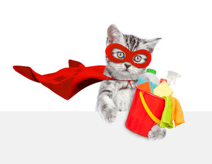 Poster - Cute kitten wearing superhero costume holds bucket with washing fluids above empty white banner. Isolated on white background