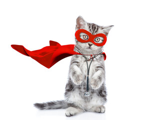 Sticker - Cute kitten wearing like a doctor with superhero cape and with stethoscope on his neck looks at camera. Isolated on white background