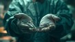 Detailed view of a surgeon's hands holding surgical instruments, ready for a life-saving operation