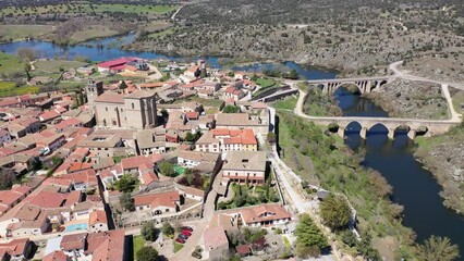 Wall Mural - Scenic aerial cityscape of Ledesma town and Tormes river at spring, Salamanca region, western Spain