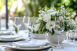 Elegance table setting for party, event, banquet, wedding outdoors with gentle pure white flowers.